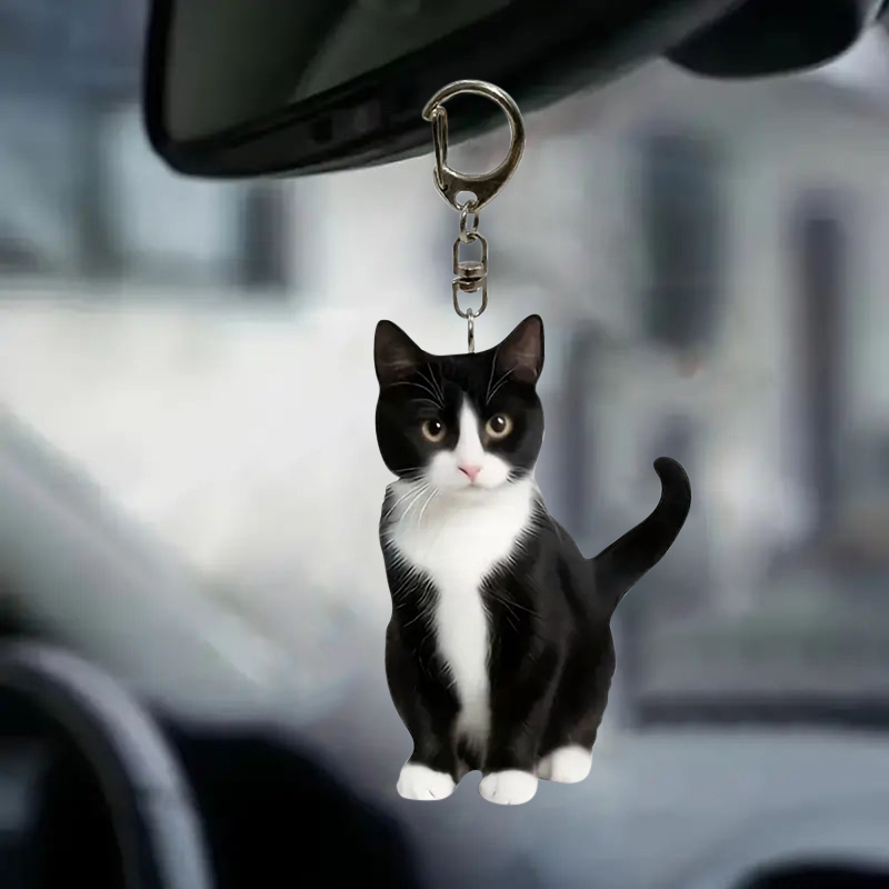 Zwart-witte kat sleutelhanger  - Resin Art Ring Design recensie en prijs